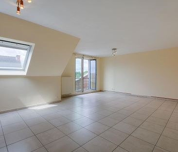 Lichtrijk dakappartement nabij centrum - Foto 4