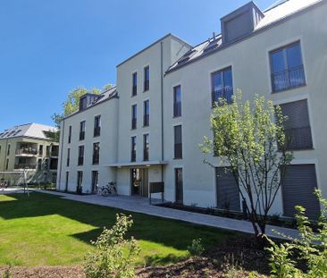 Moderne Neubauwohnung mit Gartenanteil - Foto 1