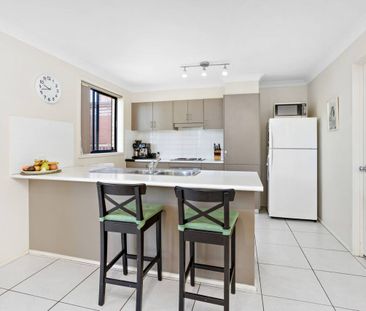 Low maintenance family living - Photo 2