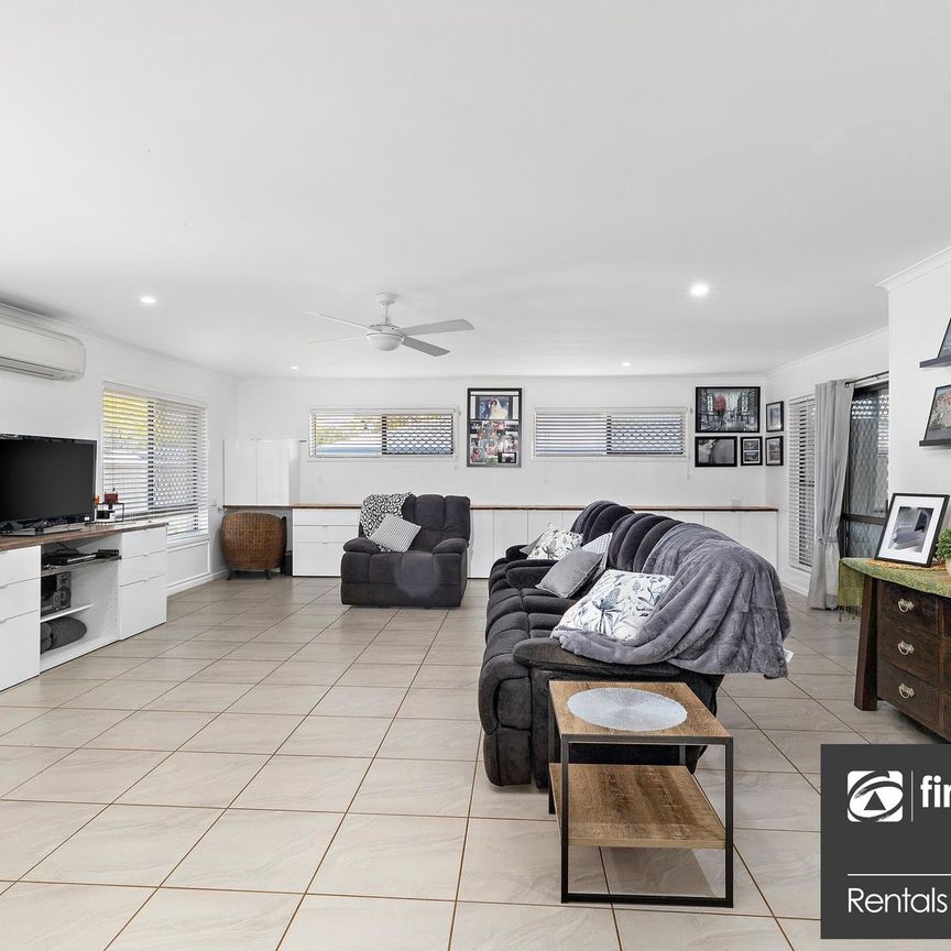 Modern Lowset Family Home with Side Access + Large Shed - Photo 1