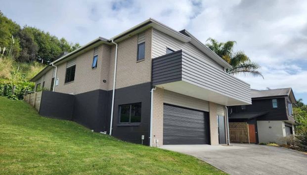 Modern Four Bedroom Home with Views - Photo 1