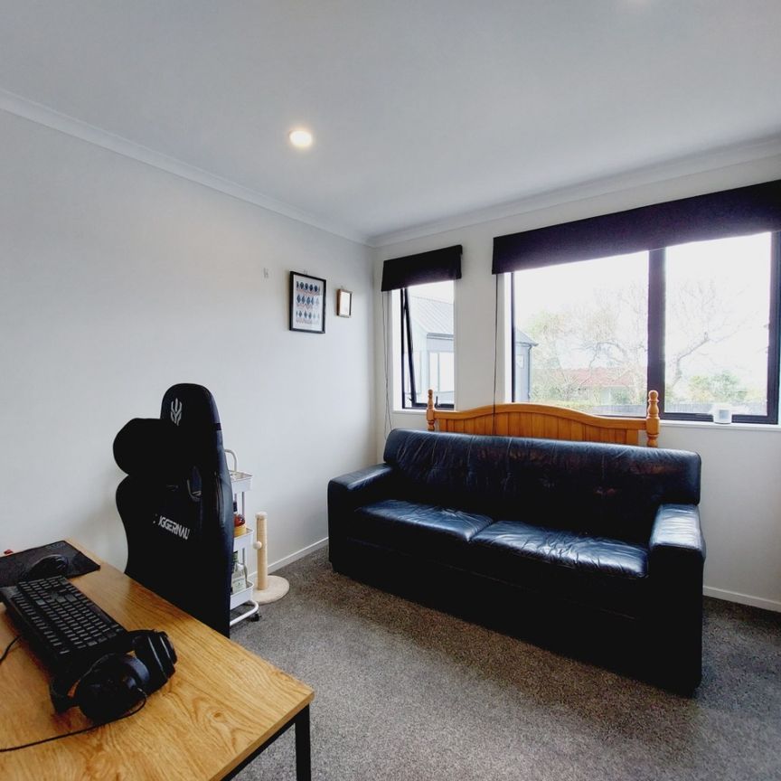 Stylish 2-Bedroom Home with Modern Comforts & Private Outdoor Spaces - Photo 1