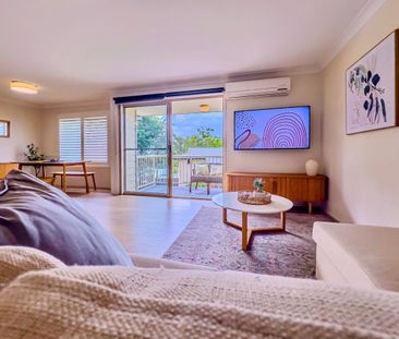 Stylishly Renovated Townhouse in Sought-After Gated Estate - Photo 2