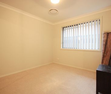 Stylish Family Home Offering Comfort, Space & Convenience - Photo 4