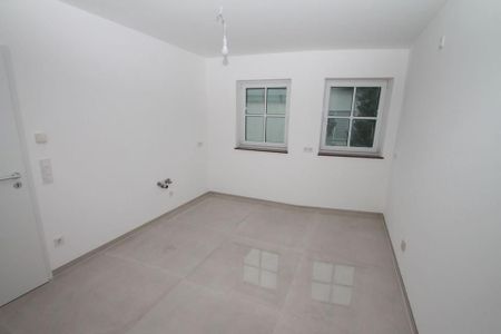 Stilvoll sanierte 2-Zimmer-Wohnung mit Fußbodenheizung und Balkon - Photo 2