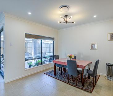 Spacious Family Home with Large Yard in Logan Reserve - Photo 4