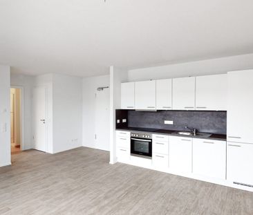 Penthousewohnung mit Blick über die Dächer Langens - Foto 3