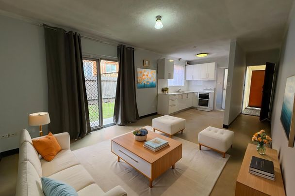 Neat & Tidy 3 bedroom ground floor unit - Photo 1