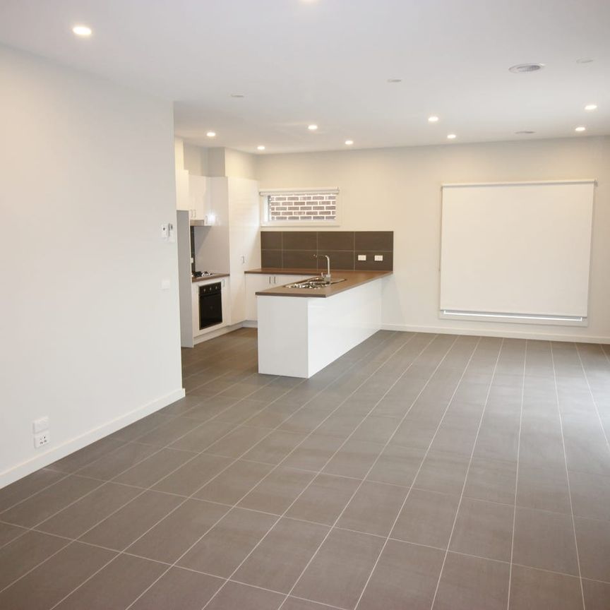 MODERN TWO BEDROOM UNIT WITH DOUBLE GARAGE - Photo 1