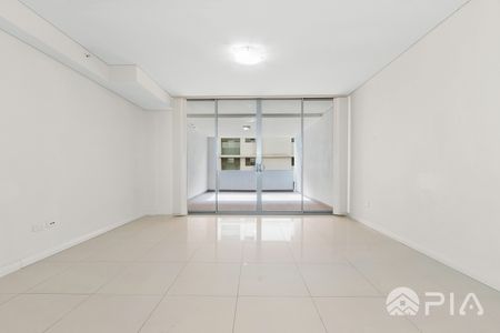 Large Two Bedroom Apartment with Two Parking Slots - Photo 2