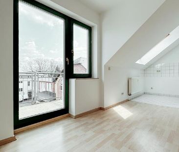 Großzügige Dachgeschoss-Wohnung mit Balkon - Foto 1