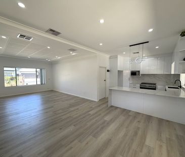 Stylish Fully Renovated Family Home with Rumpus Room! - Photo 2