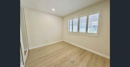 Luxuriously Renovated Beachfront Apartment with Ocean Views - Photo 2