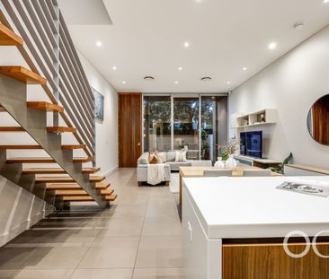Open the Door to Designer Living in the Heart of Norwood - Photo 1