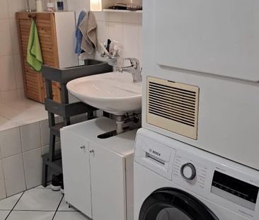 Appartement de 2,5 pièces au rez-de-chaussée - Photo 2