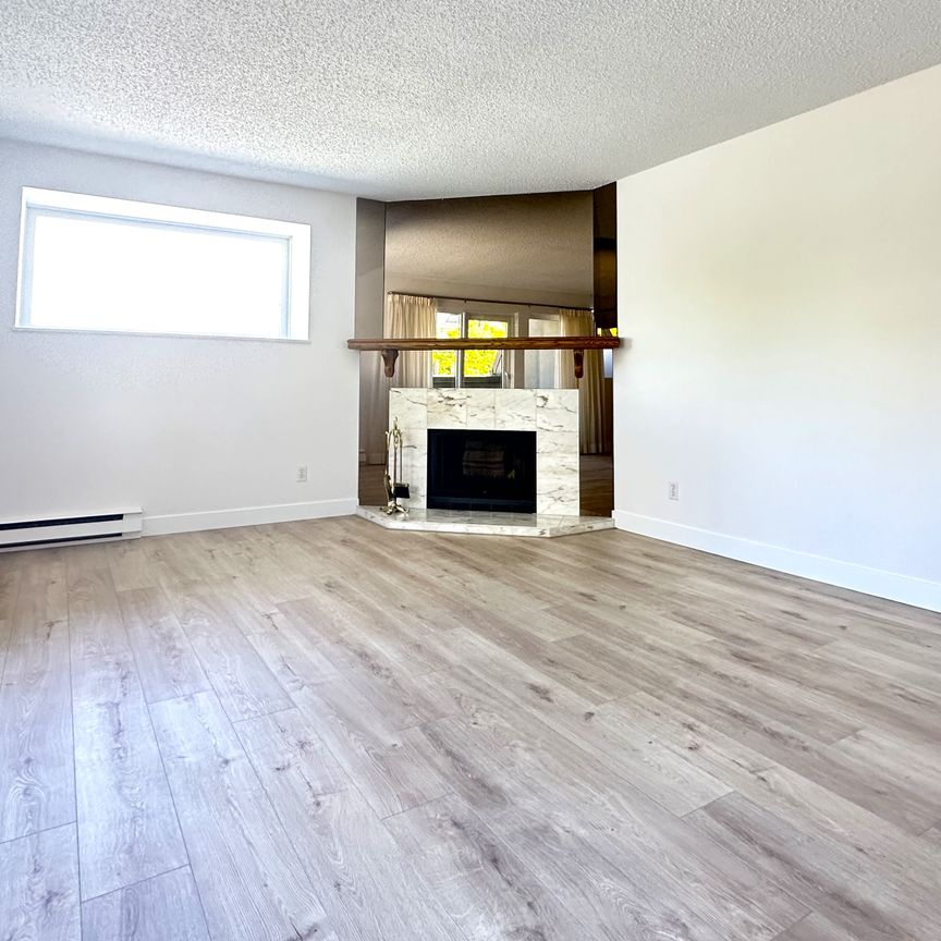 Fairview Gem: Stylish Townhouse Living At Its Finest. - Photo 1