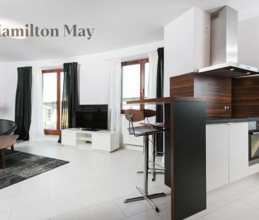 Eleganckie dwupokojowe mieszkanie przy ulicy Henryka Wieniawskiego - Zdjęcie 1