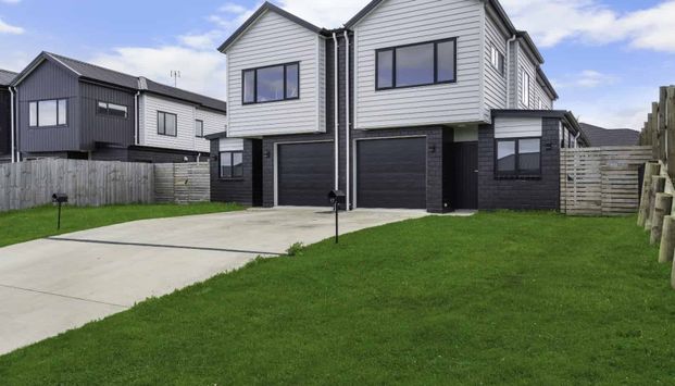Modern 4-Bedroom in Prime Rototuna Location - Photo 1