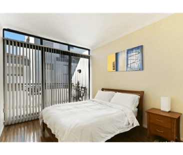 Secure Modern 1 bedroom Unit with Balcony & parking - Photo 2