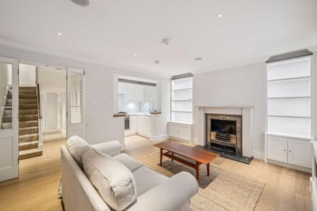 A beautifully presented white stucco-fronted townhouse available to rent in the heart of Belgravia, SW1. - Photo 3