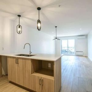 Condo locatif neuf de 2 chambres à louer à Lavaltrie - Photo 2