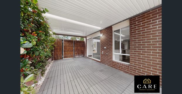 Stylish & Low-Maintenance Home with Entertainer’s Appeal - Photo 1