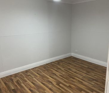 Modern, Accessible 3- Bedroom Home Minutes from the Water - Photo 4