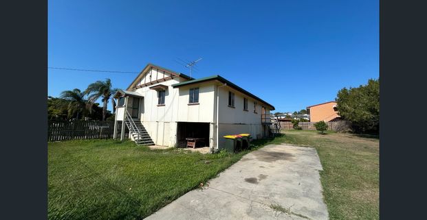 SPACIOUS QUEENSLANDER WITH EXTRA MULTI PURPOSE ROOM AVAILABLE NOW! - Photo 1