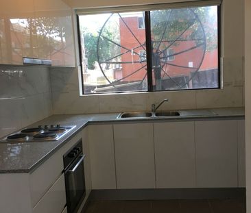 CONVENIENTLY LOCATED 2 BEDROOM UNIT - Photo 4