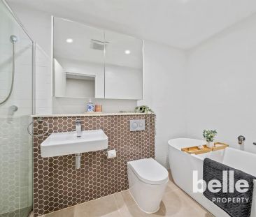 Substantial apartment within walking distance to shops and Light Ra... - Photo 5