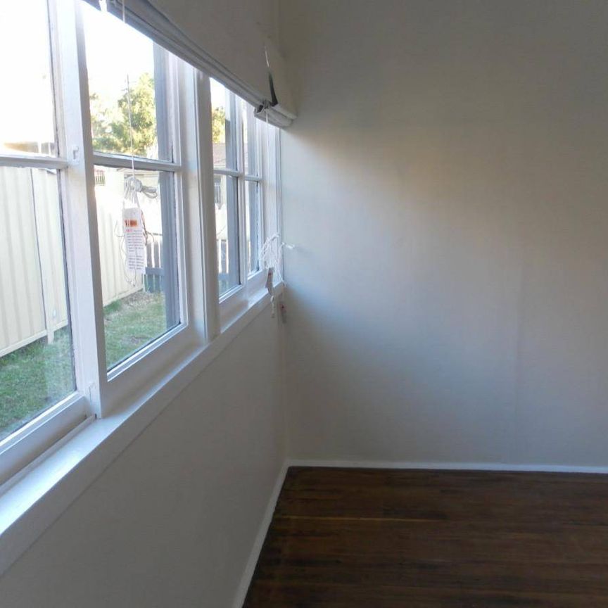 RENOVATED AND WELL LOCATED HOME - Photo 1