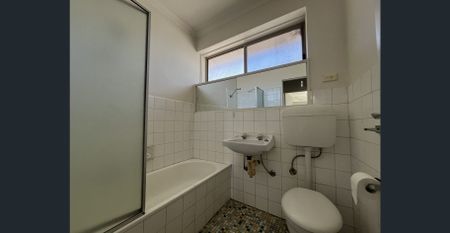 Bright & Spacious Top-Floor Living with Scenic Outlooks - Photo 5