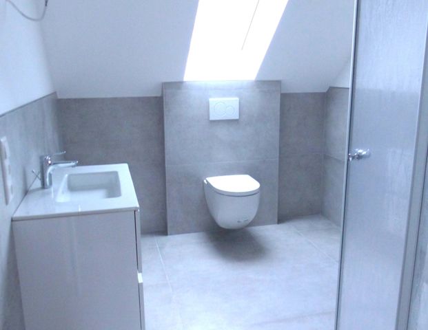 Vermietung: Erstbezug, moderne Obergeschosswohnung mit Balkon und Carport in Westoverledingen - Foto 1