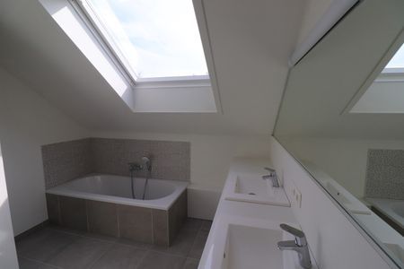 Modern en energiezuinig 2-slaapkamerappartement met carport en ruim terras. - Foto 4