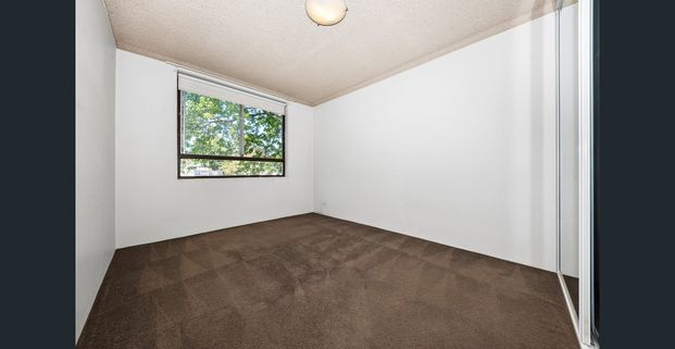 Spacious Two Bedroom Apartment with Parking in Ideal Location - Photo 1