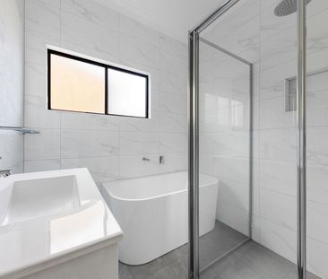 Refurbished Family Home with Huge Rear Yard - Photo 4