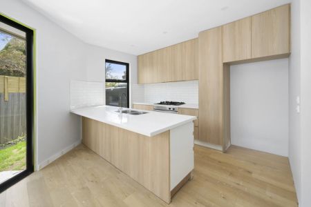 Brand New, Stylish and Low-Maintenance Living - Photo 3