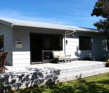 Tidy Three-Bedroom Home with Great Outdoor Living - Photo 2