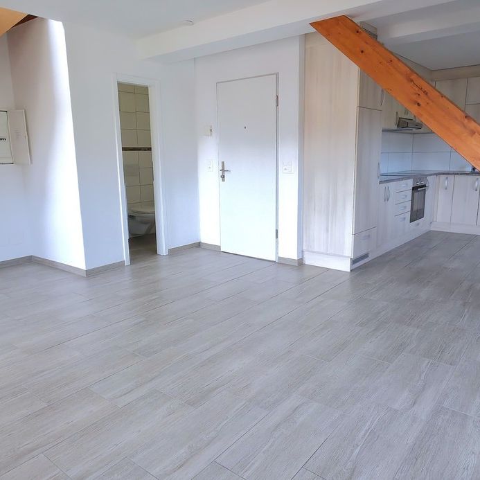 Rent a 2 ½ rooms duplex in Courchapoix - Photo 1