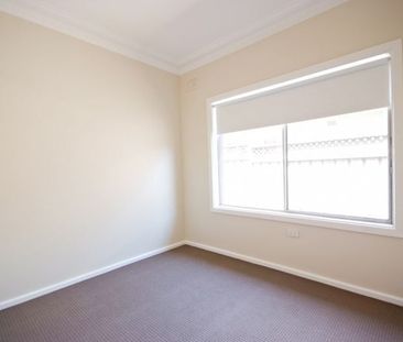 Three bedroom home in sought after location - Photo 2