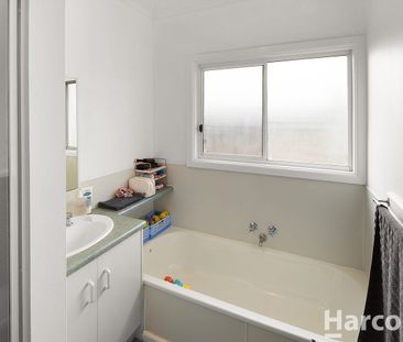 Neat Weatherboard Home - Photo 6