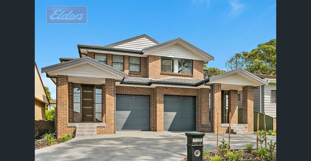 Quality Four Bedroom Duplex - Pet Friendly - Photo 1