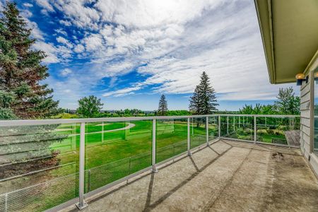 44 Woodgrove Crescent Southwest, Calgary - Photo 5