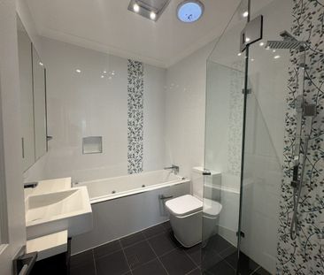 FULLY RENOVATED 3 BEDROOM FAMILY HOME IN GREAT LOCATION - Photo 6