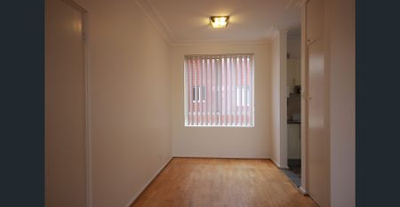 LOCATED ON FIRST FLOOR! - Photo 2