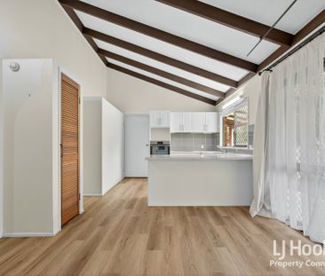 Low Set Brick Home Offering Comfort, Convenience and Charm - Photo 1