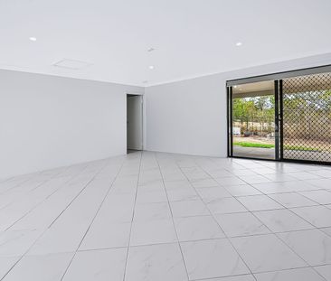Back Property - Spacious Family Living with Solar, Water Tanks & Mo... - Photo 1
