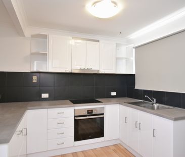 MODERN COMFORT MEETS EVERYDAY CONVENIENCE - WELCOME TO 5/4 LAMINGTO... - Photo 1