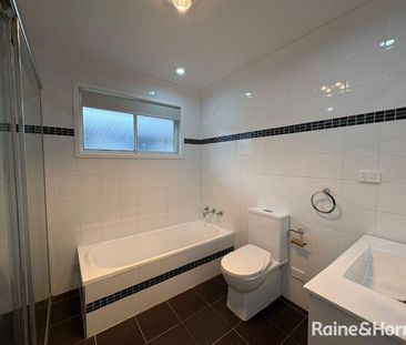 Charming Minto Family Home with Sparkling Swimming Pool - Photo 1