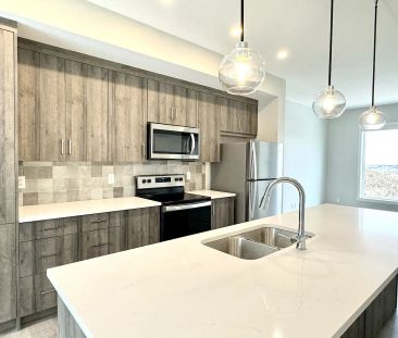 Near LRT Brand New 3B Townhouse in Shawnee Slopes — 3 Bedrooms Town... - Photo 1